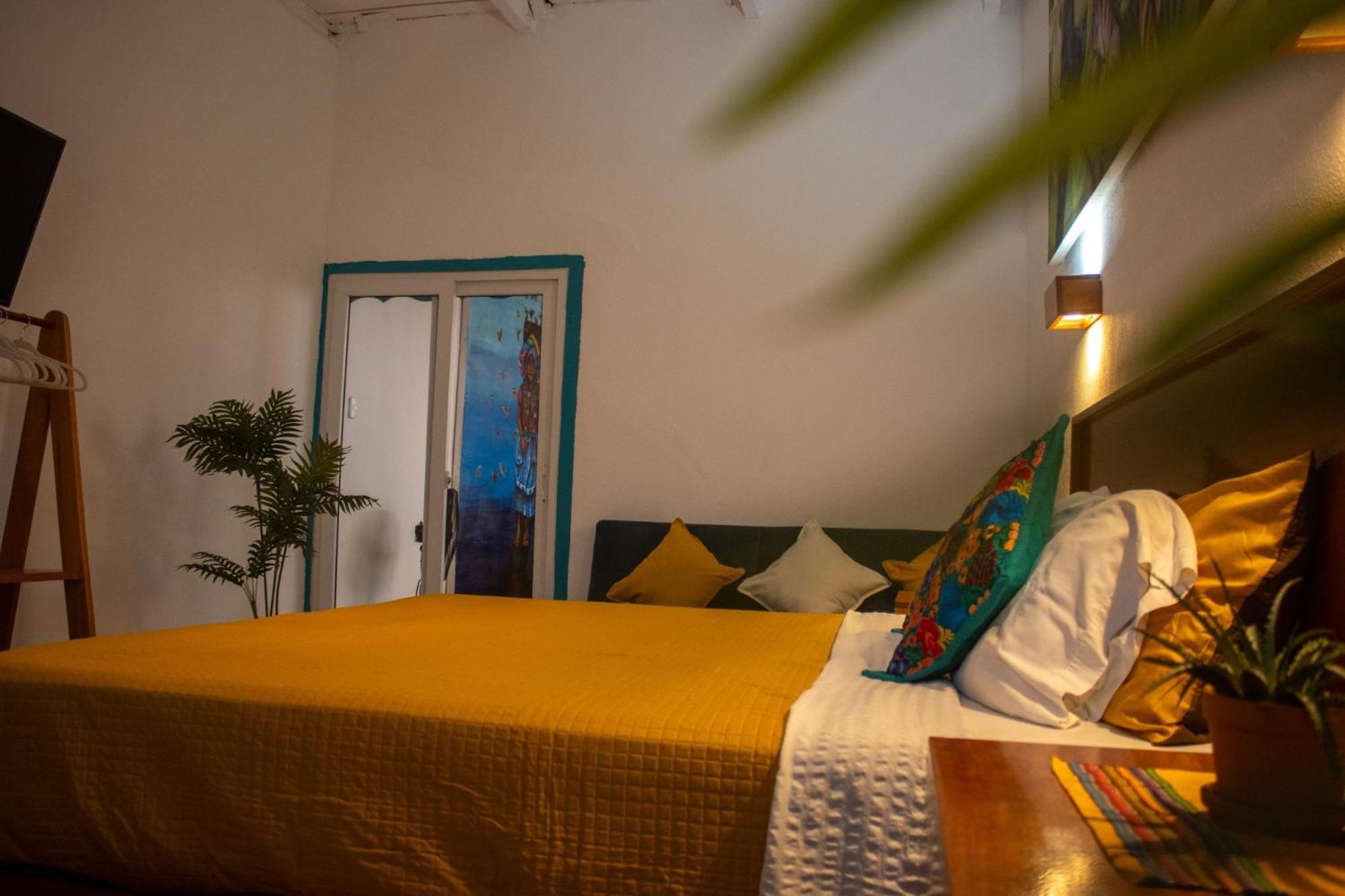 Los Amigos Hostel Flores Rum bild